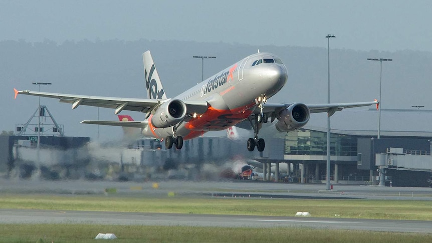 A Jetstar plane takes off from Perth Airport