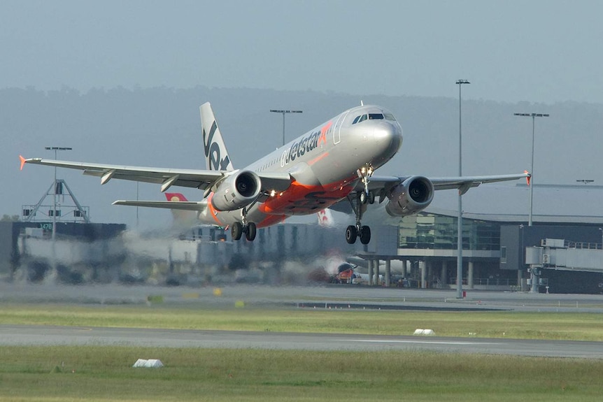 A Jetstar plane takes off from Perth Airport