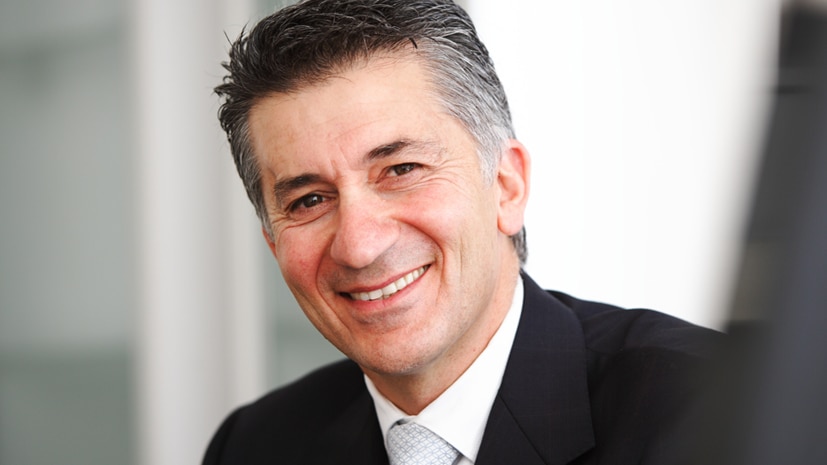 John Falzon smiling in a portrait.