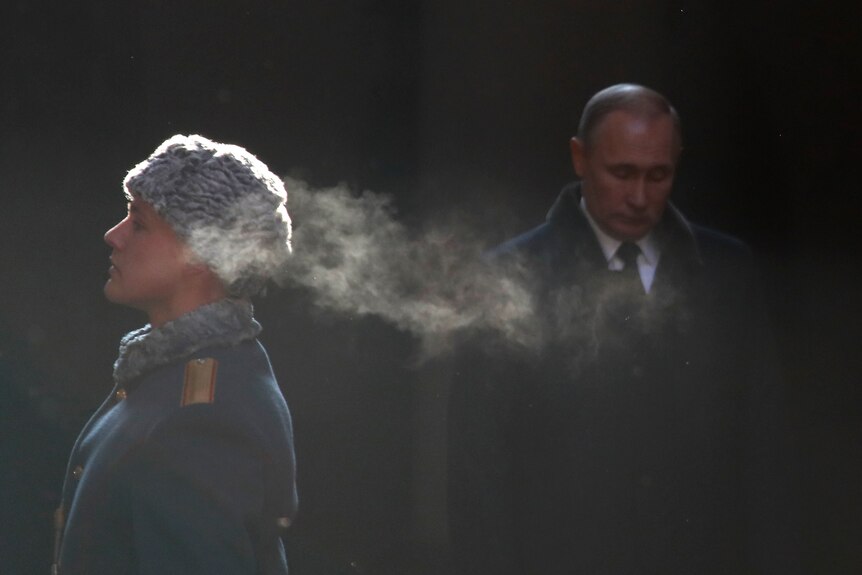 President Vladimir Putin attends a wreath laying ceremony at the eternal flame.