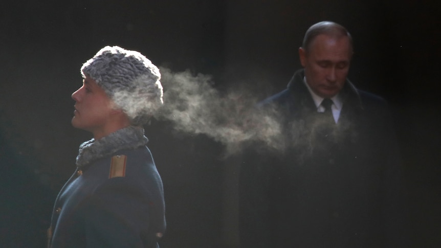 President Vladimir Putin attends a wreath laying ceremony at the eternal flame.