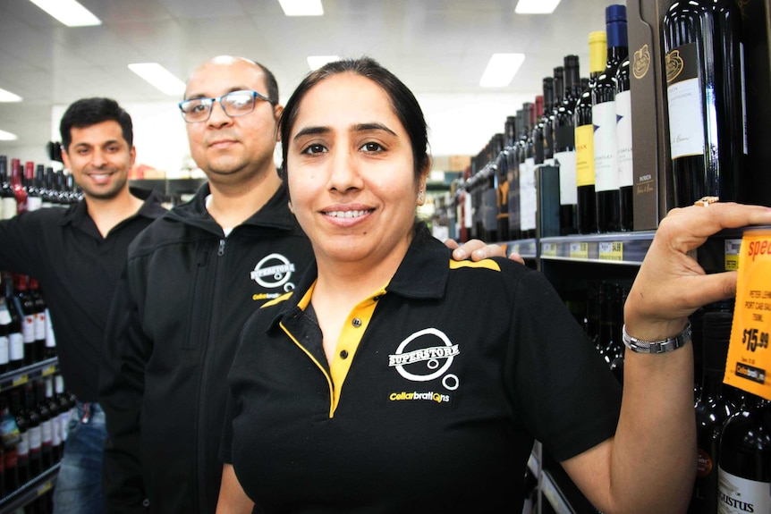 New Horsham residents (from right to left) Pooja Bhutani and her husband Mukesh, along with Sukoon Bedi in their western Victoria Cellarbrations outlet.