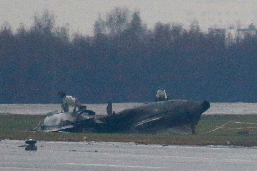 The wreckage of what is believed to be Christophe de Margerie's jet