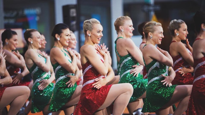 Sophie Holloway performs outside with the Rockettes.