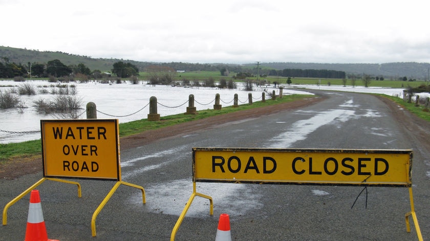 Road closed signs on Ross road.