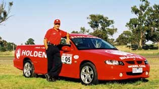 Peter Brock with a Holden ute.