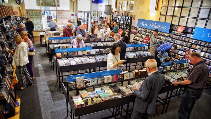 Customers looking at CDs.