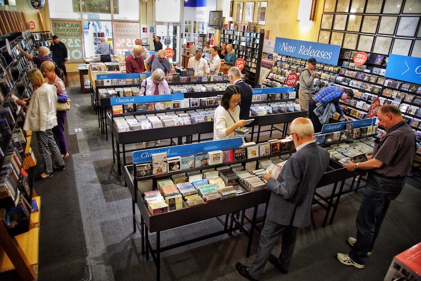 Customers looking at CDs.