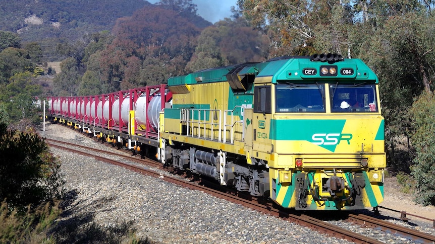 The SSR train departing Centennial Coal's Charbon facility with water carriages on the back