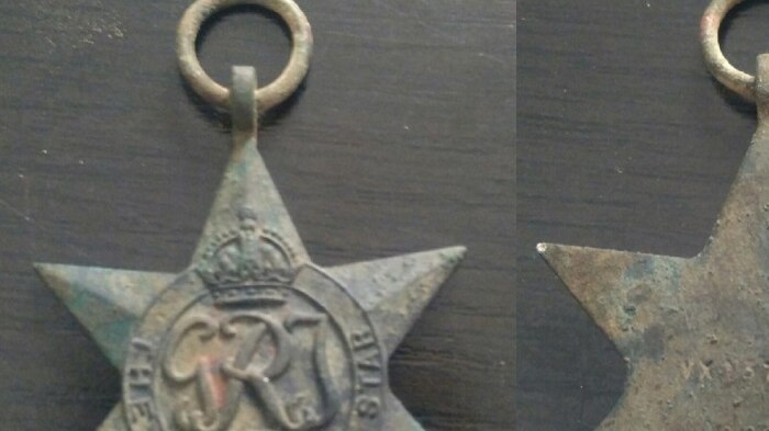 The front and back of a World War Two Star Medal dug up in a park in Melbourne