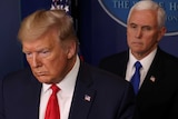 US President Donald Trump and VP Mike Pence looking sombre in the White House press briefing room