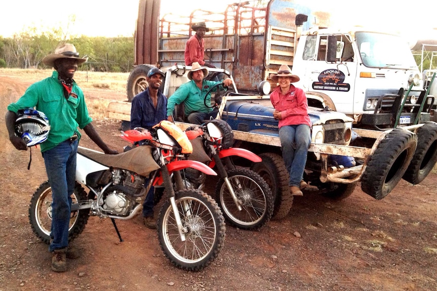 Contract musterers with motorcycles and a car.