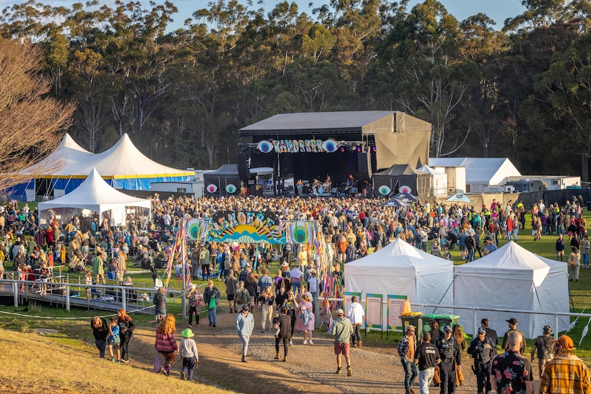 a crowd of people and a stage