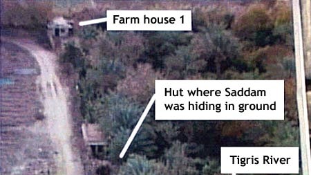 Photograph showing the area where US troops captured Saddam Hussein.