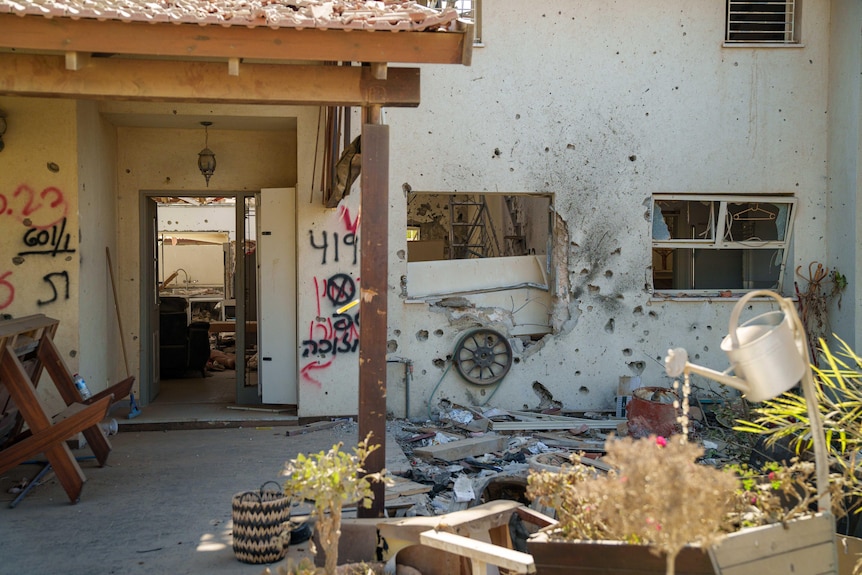 A home riddled with bullet holes 