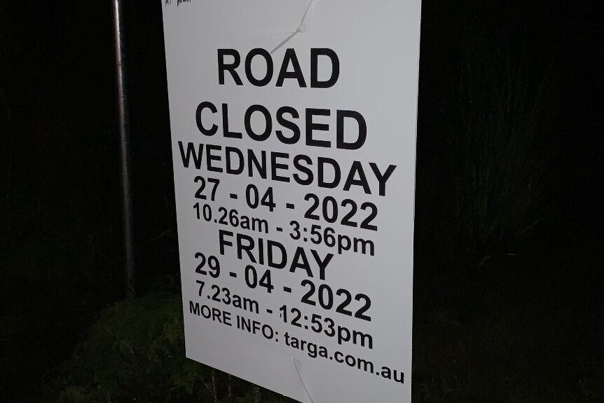 A sign reading road closed