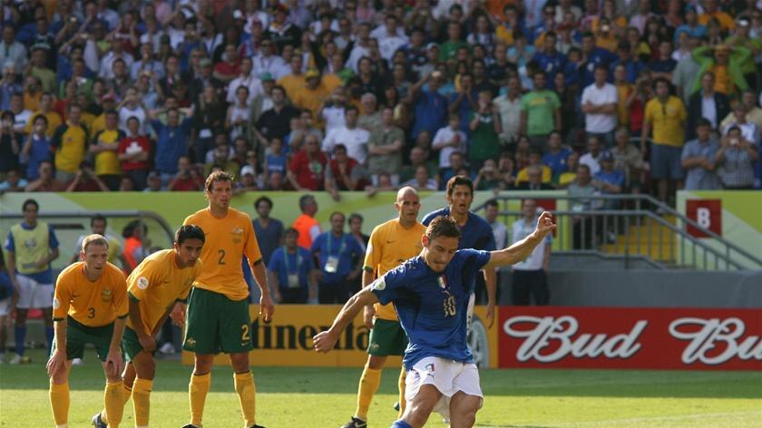 Italy's Francesco Totti kicks a penalty