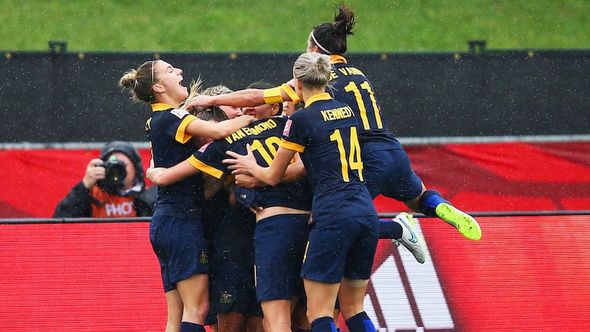 Kyah Simon swamped after scoring for Matildas against Brazil