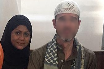 Muslim soldier with his wife
