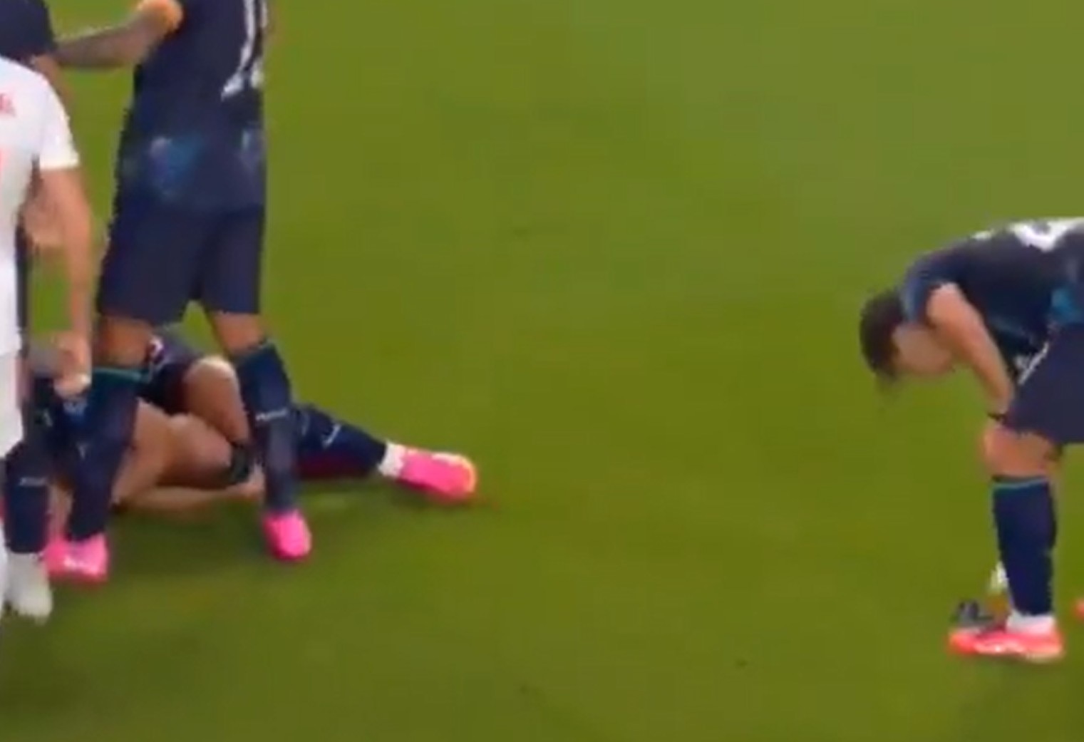 Paraguay's Matias Galarza picks up the referee's watch during a game.