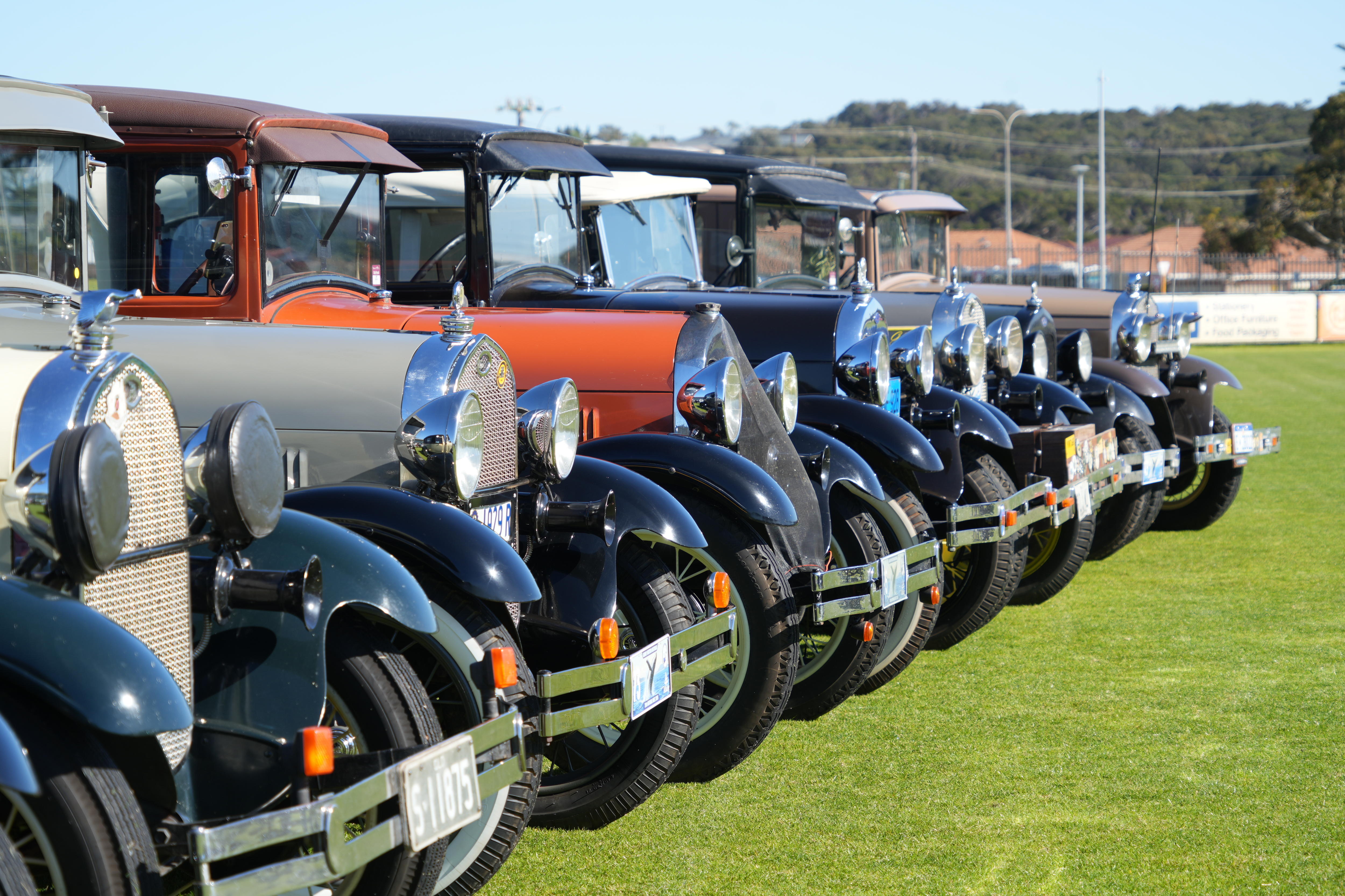 a row of vintage cars