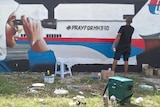 Graffiti artist paints mural in tribute to MH370 passengers