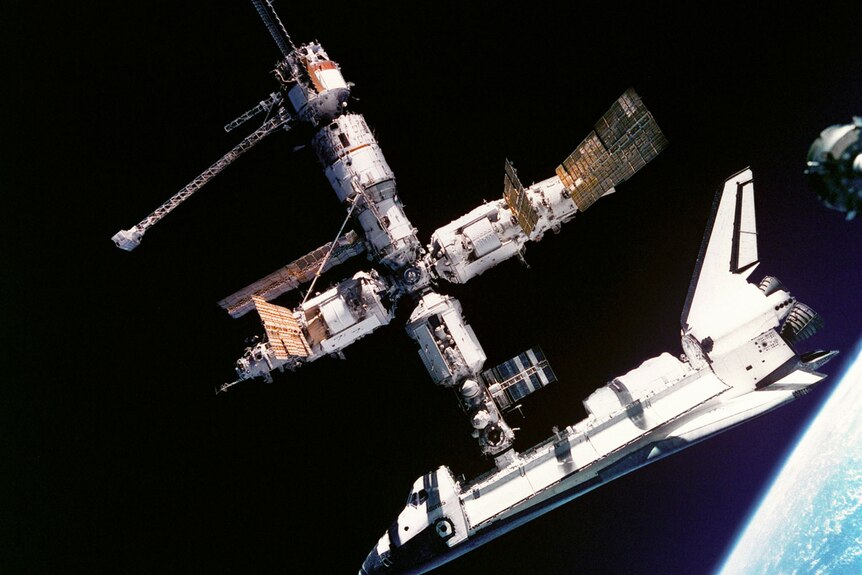 A spacecraft docking with a space station