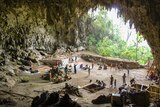 Team of archaeologists working in the Liang Bua cave on Indonesia's Flores Island
