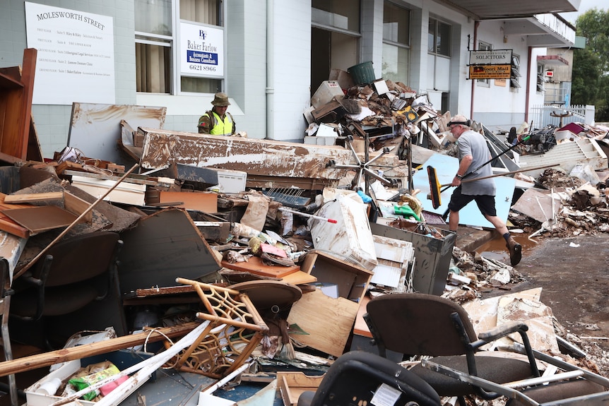 ADF personnel clean up after flood