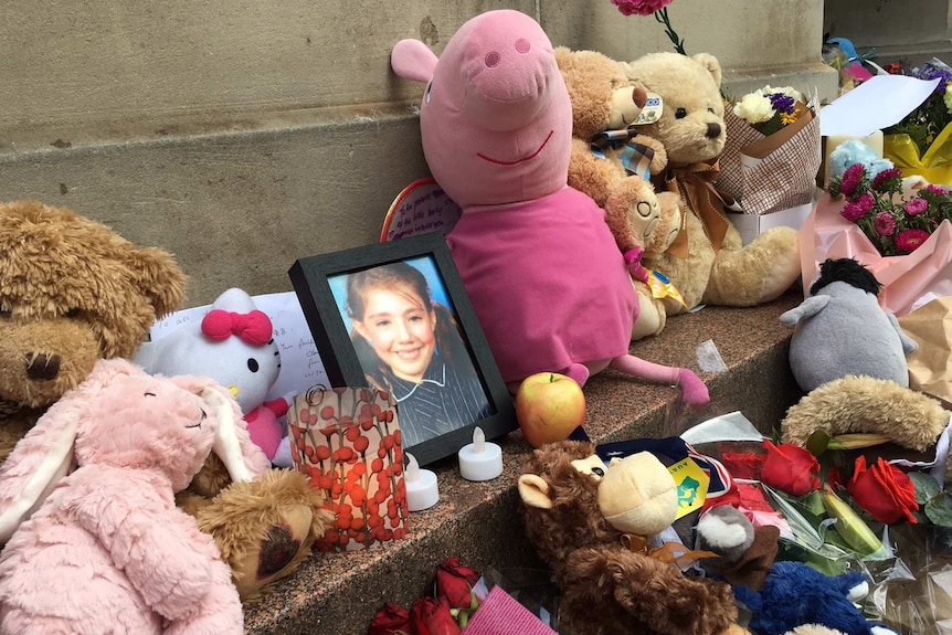 A photo of 10-year-old Thalia Hakin at a memorial for the victims of the Bourke St car attack.