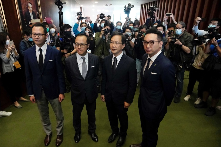 Hong Kong MPs, from left, Dennis Kwok, Kenneth Leung, Kwok Ka-ki and Alvin Yeung pose for the media.