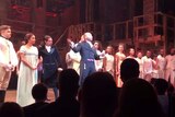 Brandon Victor Dixon is surrounded by castmates from Hamilton as he reads a statement to Vice-President elect Mike Pence