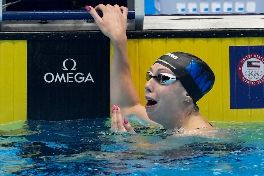 Gretchen Walsh reacts after breaking the world record in the women's 100m butterfly.