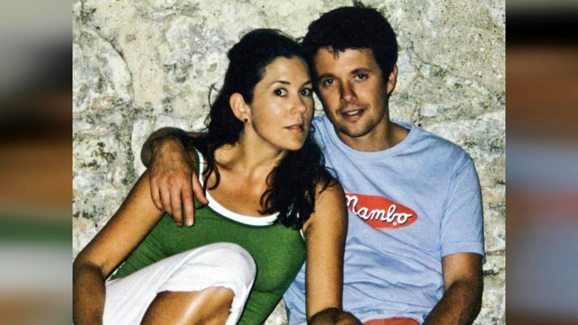 a young prince frederick wearing a mambo t-shirt with his arm around australian mary donaldson