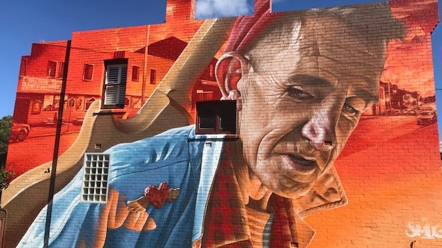 Smug mural in North Hobart featuring Cameron Williams