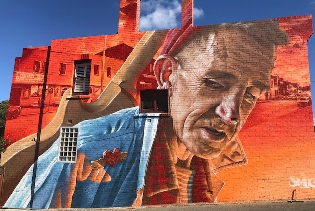 Smug mural in North Hobart featuring Cameron Williams