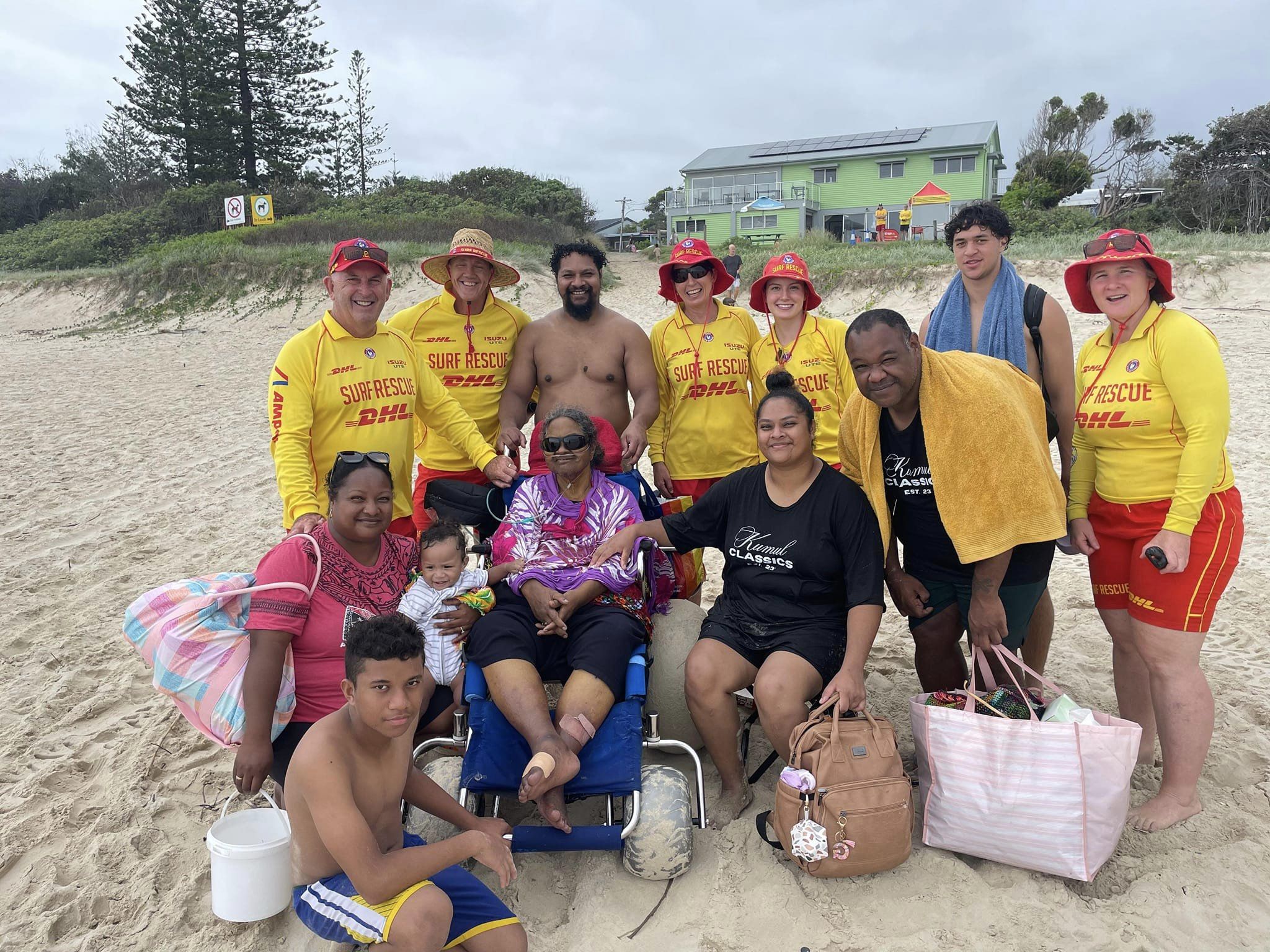 people on beach smiling