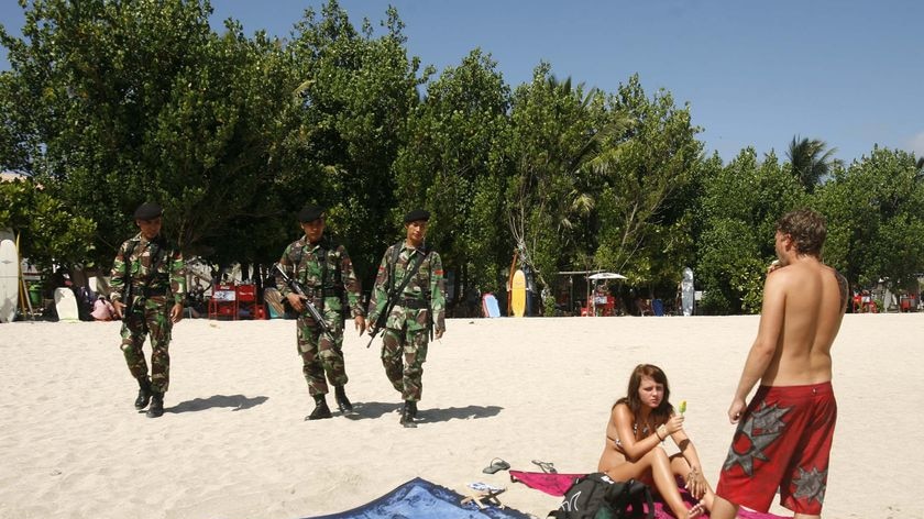 Soldiers patrol Bali beach