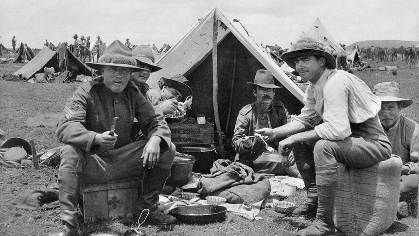 Soldiers eating breakfast on the veldt