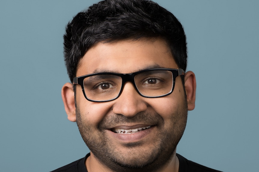 Bio shoot supplied of Parag Agrawal smiling, wearing a black t-shirt