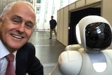 Malcolm Turnbull with robot in Tokyo