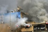 Smoke rises from the Future TV studios after it was set ablaze by opposition gunmen in Beirut.