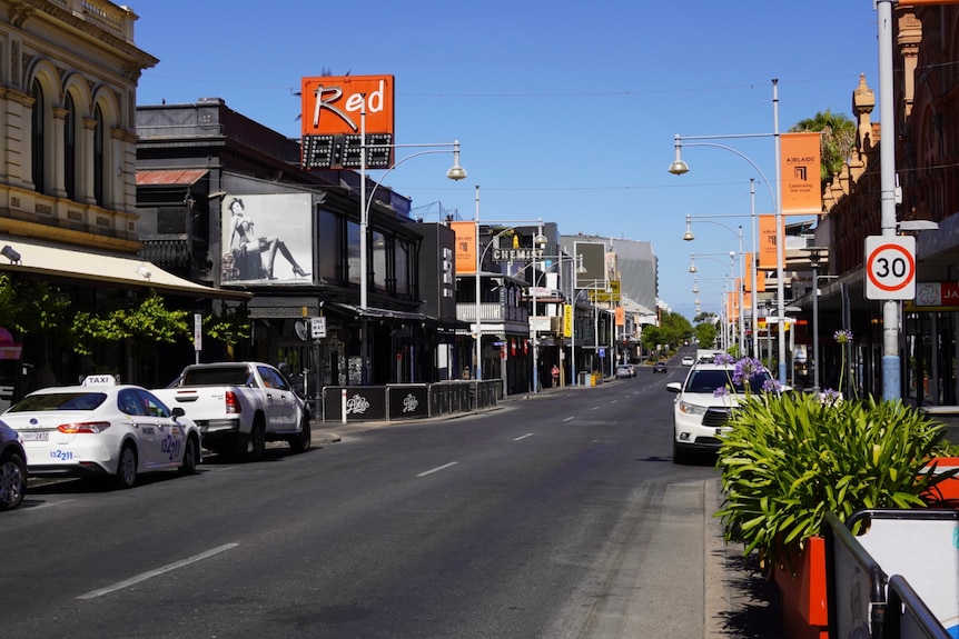 Adelaide's central party district, Hindley Street, in the middle of the day is lined with cars and no revelers