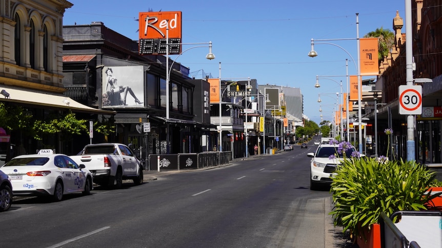 Adelaide's central party district, Hindley Street, in the middle of the day is lined with cars and no revelers