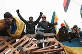 Pro-European integration protesters on barricades at Kiev's Independence Square.
