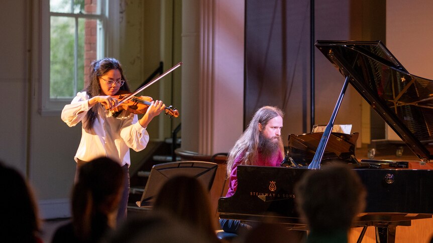 Violinist Lynda Latu and pianist Peter de Jager performing Ben Robinson's Stepping Out as part of the ANAM Set Festival. (Image: Helga Salwe)