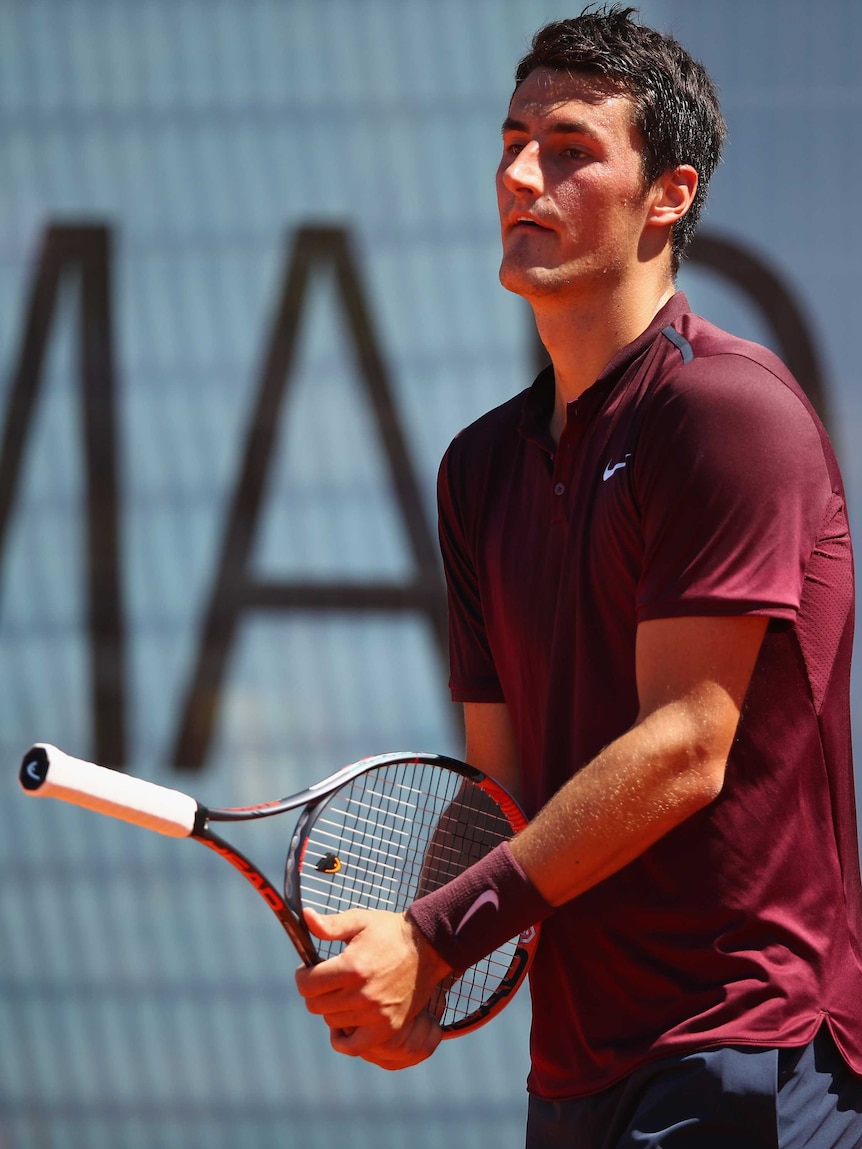 Bernard Tomic holds the racquet the wrong way round