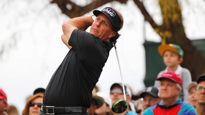 On fire ... Phil Mickelson hits his tee shot on the third hole