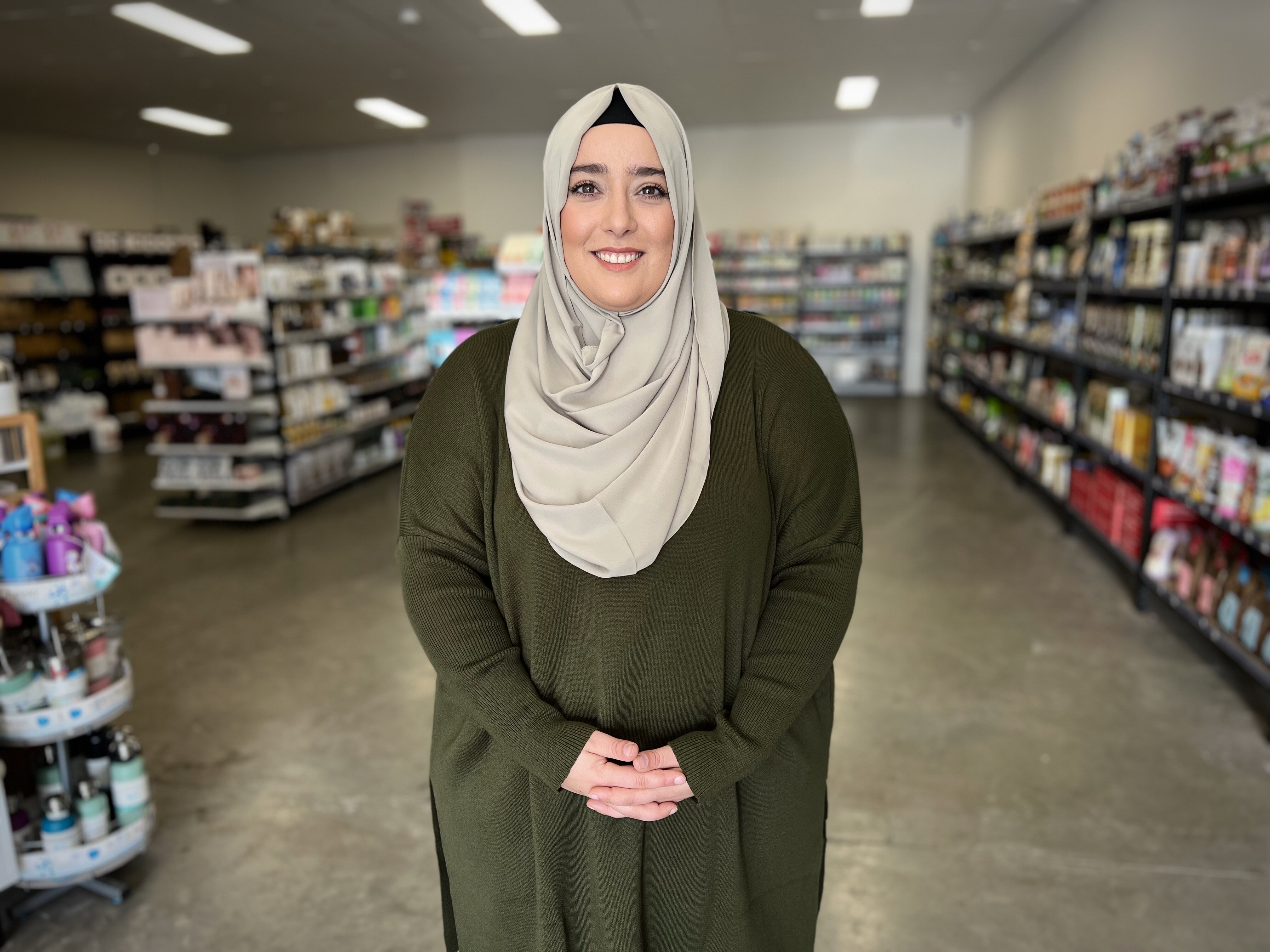 Betul Turker stands in her Coolaroo health food store in September 2022 in an interview with Nassim Khadem