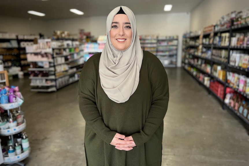 Betul Turker stands in her Coolaroo health food store in September 2022 in an interview with Nassim Khadem